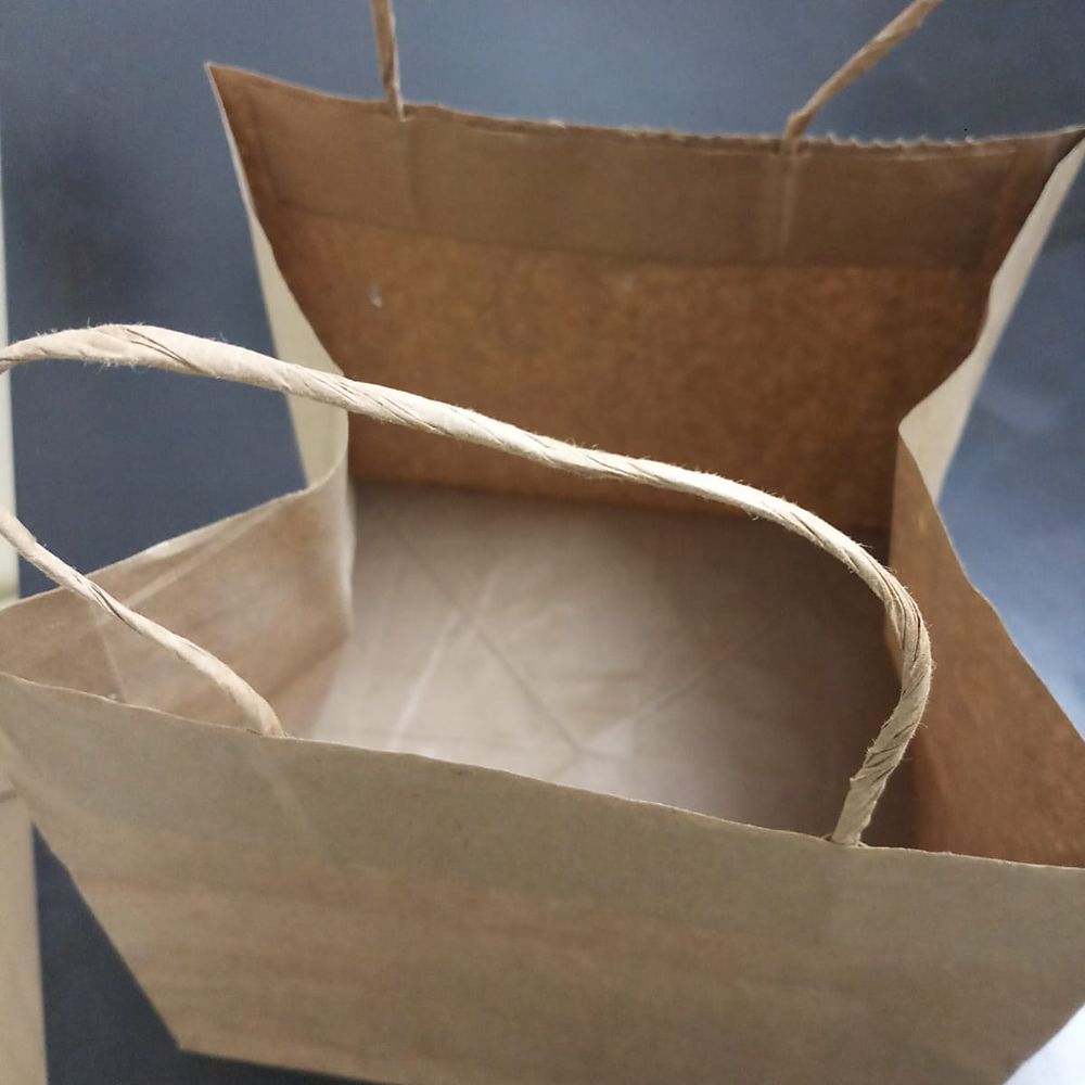 Kraft paper bag shown open from the top