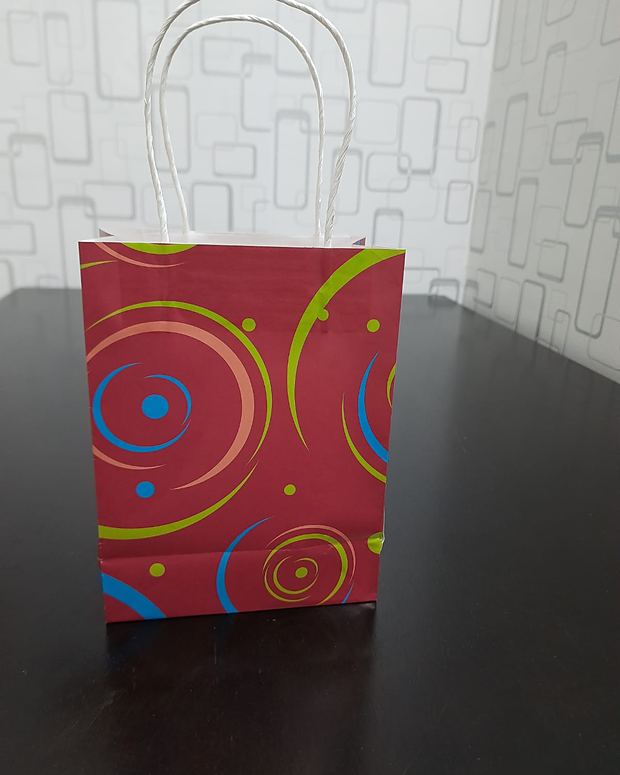 Paper bag with a printed circle pattern